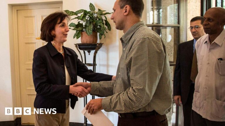 US Assistant Secretary of State Roberta Jacobson shakes hands with Cuban dissident Jose Daniel Ferrer in 2015.