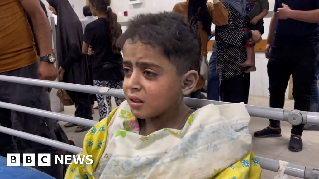 Amr al Hindi, wrapped in a gown, crying and looking worried