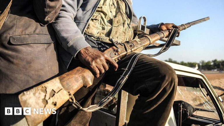 A man holding a gun