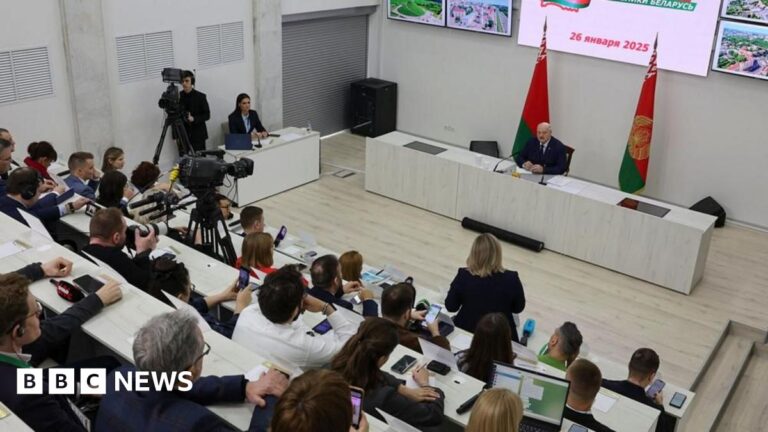 A handout picture made available by Belarus President press service shows Belarusian President Alexander Lukashenko (R) attending a press conference after casting his ballot in the presidential elections at a polling station in Minsk, Belarus, 26 January 2025
