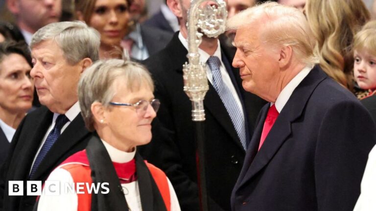 Right Rev. Mariann Edgar Budde walking past President Trump