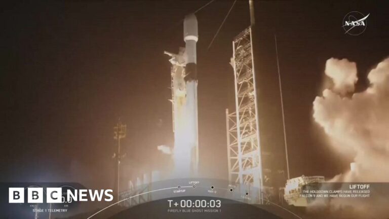 Rocket blasting off from launch pad