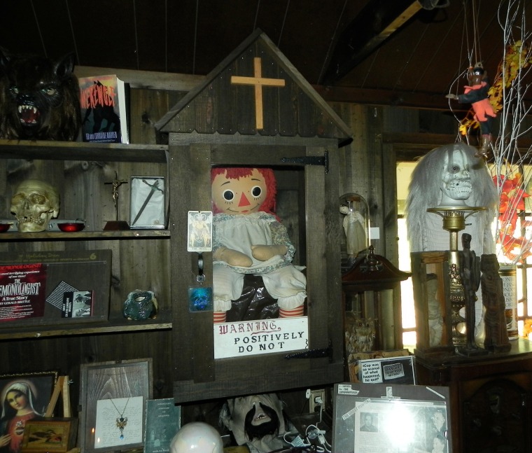 Annabelle raggedy an doll sat in case
