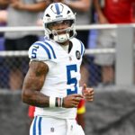 Qb Anthony Richardson leaves the game of Collitson

