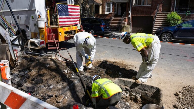 The employee of the NYC construction employees on the road