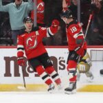 Jake Hughes scored in OT, Devils extend win streak to eight with win over Avs

