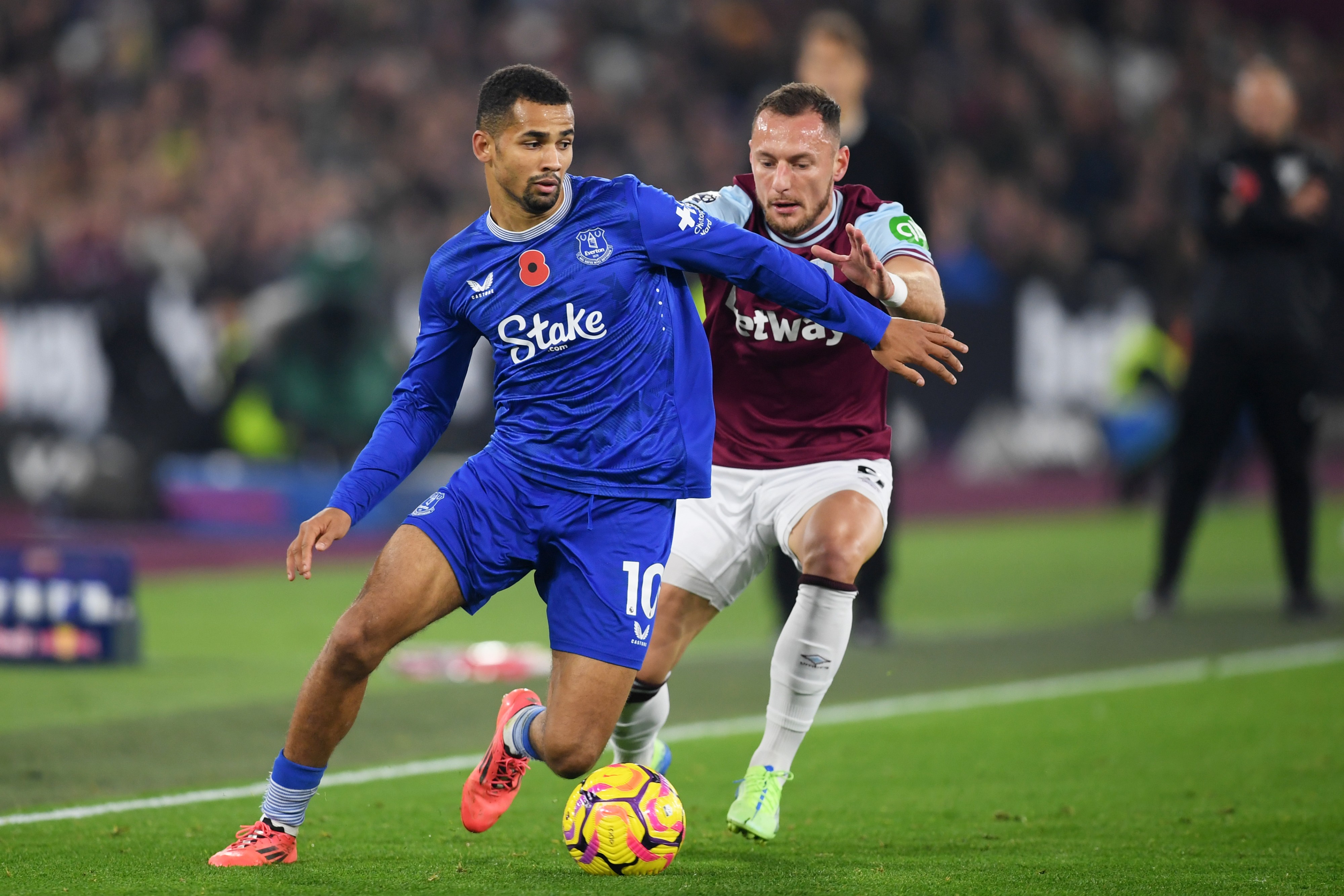 Iliman Nide of Everton is challenged by Vladimir Coufal of West