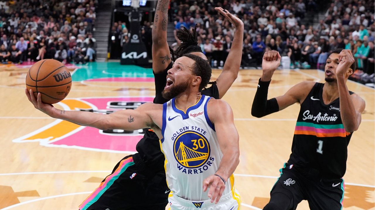 Curry 46 leads Warriors over Spurs despite Wambayama triple-double