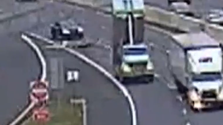 Dump Truck Slams into sign on Ohio Highway