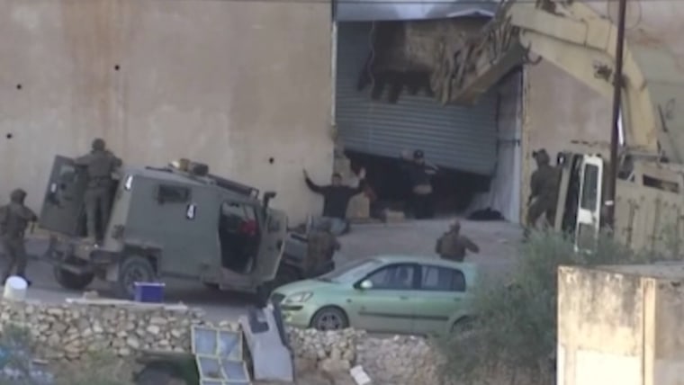 Israeli forces opened fire on two Palestinians in the West bank