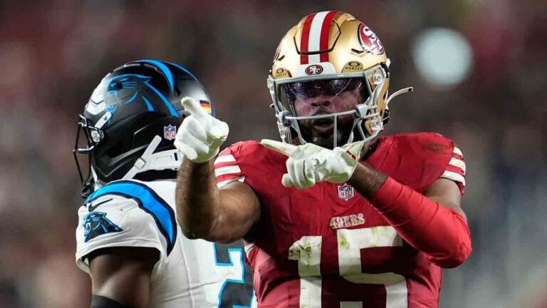 Jennings of the 49ers throws a punch at Mohrig after a cheap shot in a win over the Panthers.