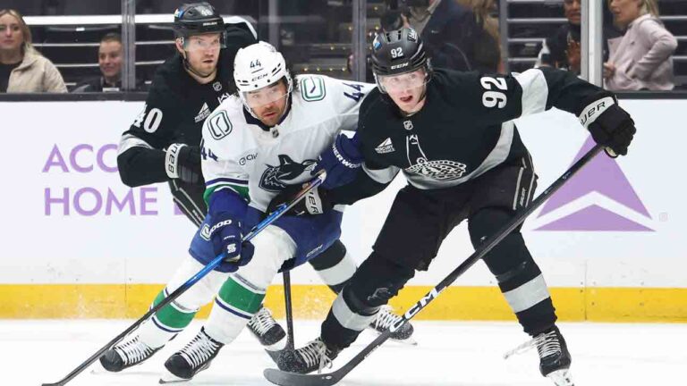 Kemp scored in overtime as the Kings downed the Canucks
