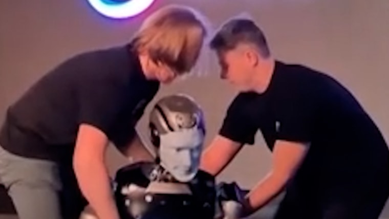 Russian Ai robot falls down on stage during debut