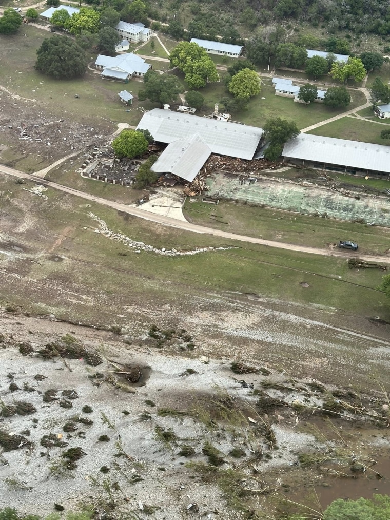 Aerial view of Camp Da Junta outside, flood damage can be seen on the surrounding land