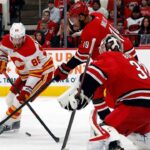 Flames can't solve Busy in OT loss to Hurricanes


